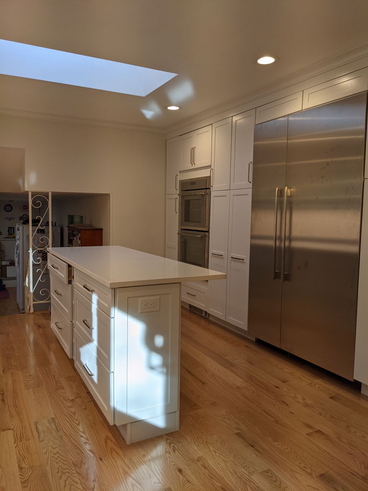 Kitchen with skylight and island — Skylight over the kitchen