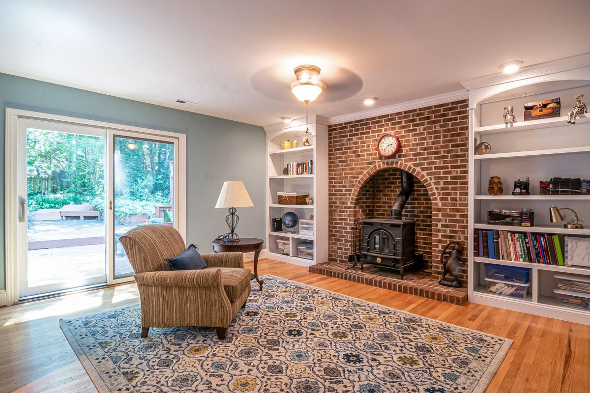 Living room with garden patio doors — Exposed brick and patio doors